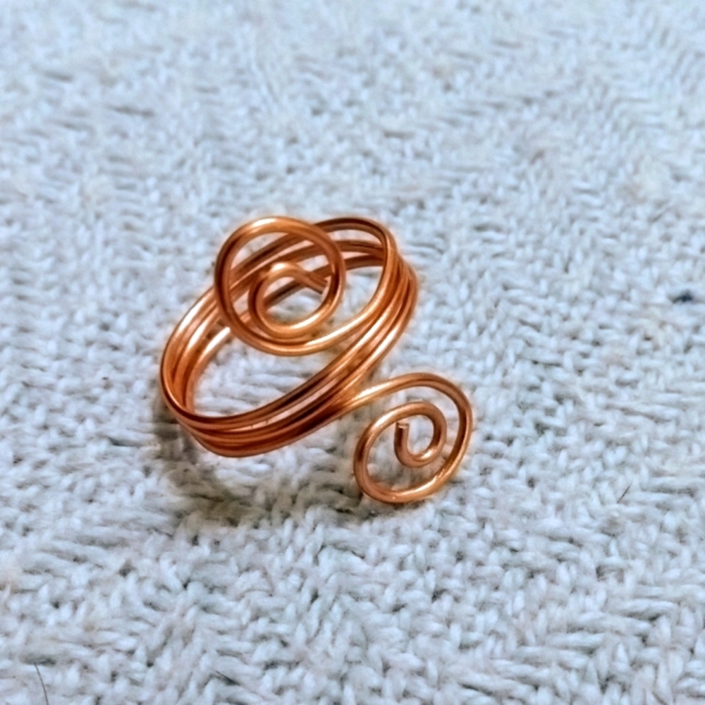 Handmade copper wire scroll ring